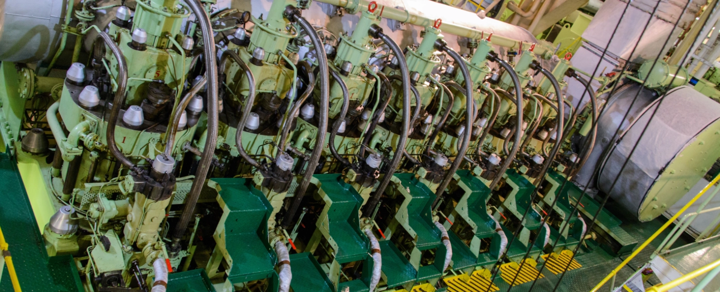 Large marine engine operating on VLSFO/ULSFO fuels, in the engine room.